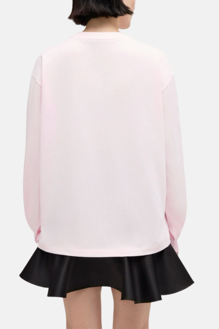 Rückansicht des GANNI Washed Effect Cotton Jersey Longsleeves in Chalk Pink, weiche Bio-Baumwolle, grafisches Design.